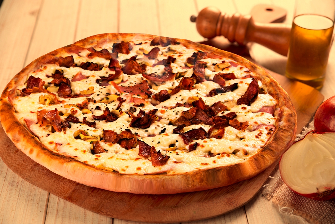 Pizzas de sabores natalinos são opções para as confraternizações de fim de ano